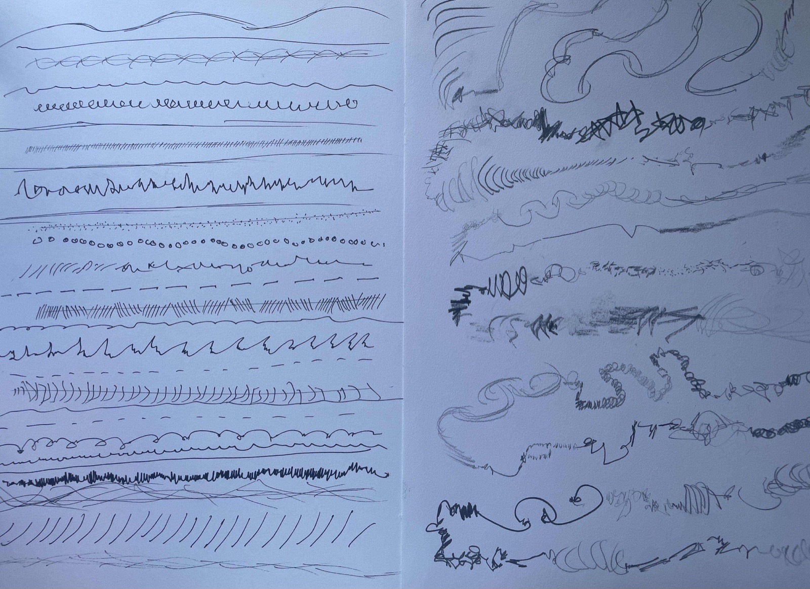two sketchbook pages filled with rows of experimental line and mark-making exercises